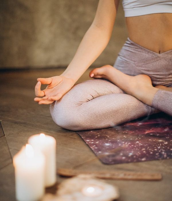 Woman meditating peacefully, embodying tranquility and inner harmony.